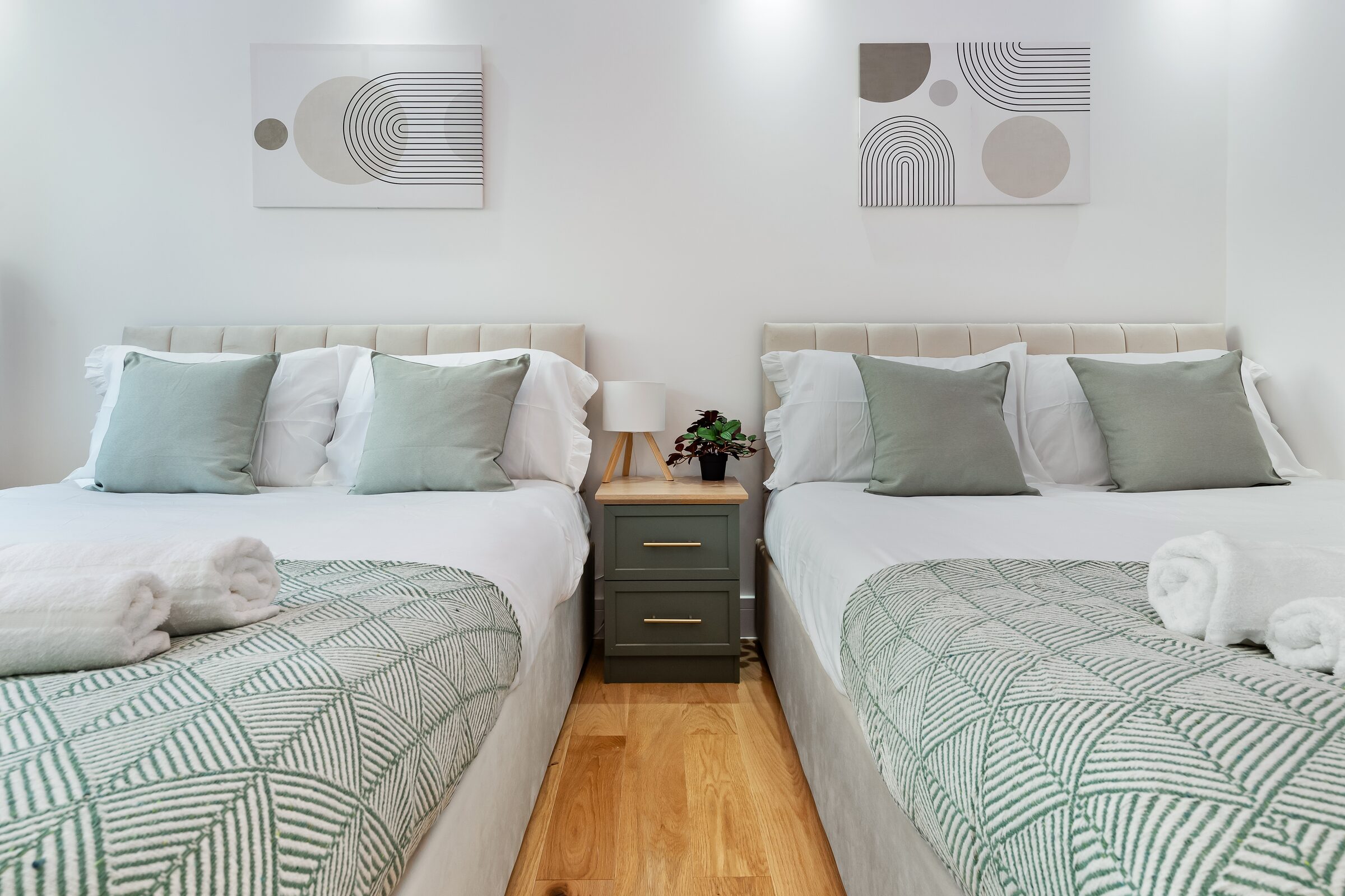 Bedroom 1 — wide view with wardrobe