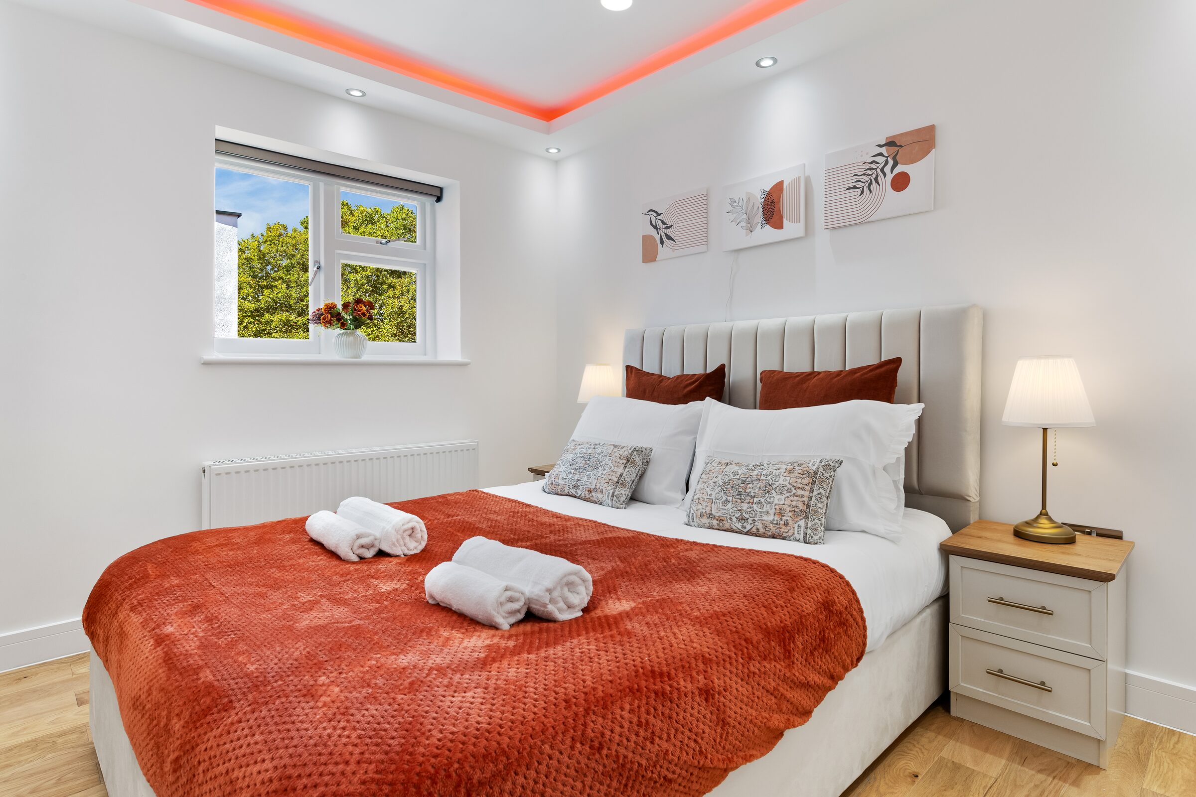 Bedroom 2 — bed with garden view window