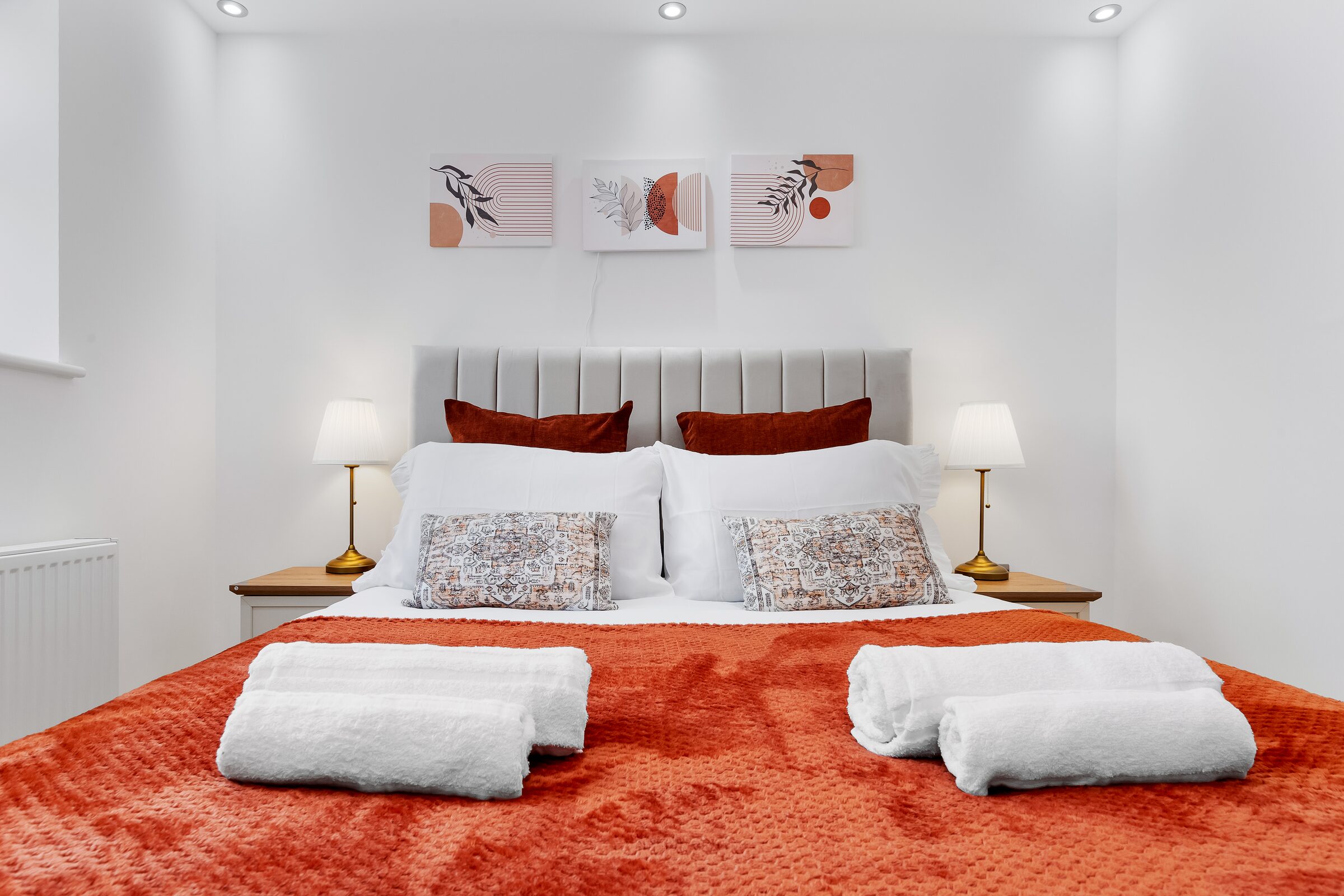 Bedroom 2 — headboard and artwork