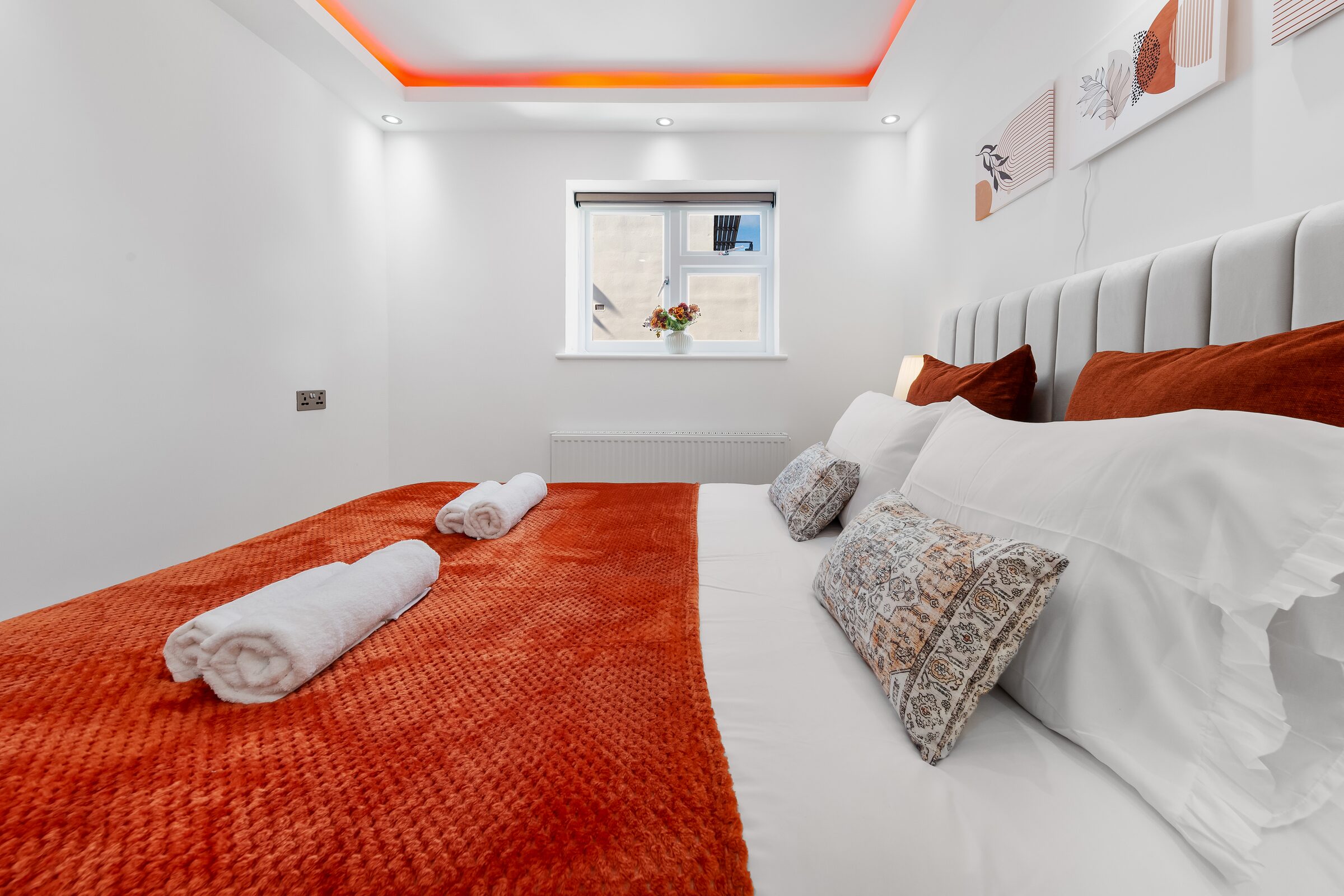 Bedroom 2 — bedside lamps and cushions