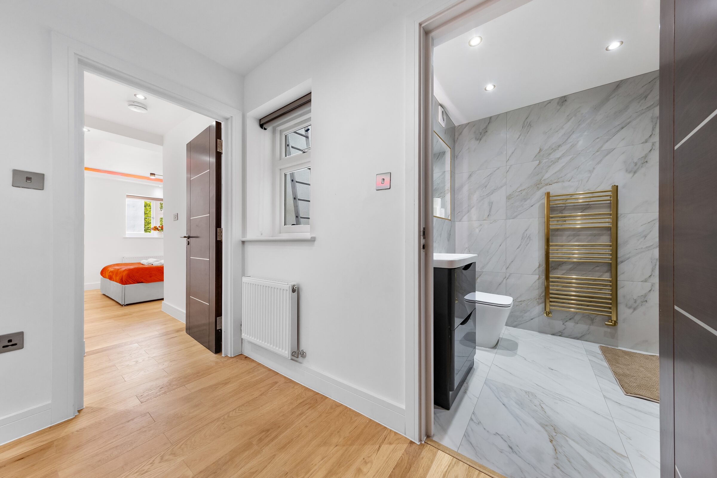 Hallway toward bathroom and bedroom
