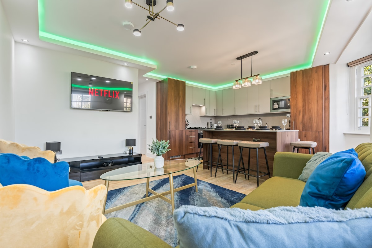Lounge with velvet sofa and Smart TV