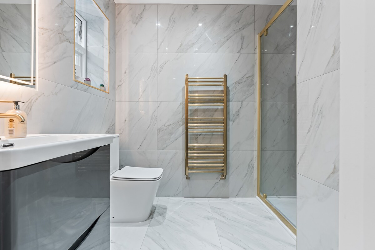 Bathroom with gold fittings