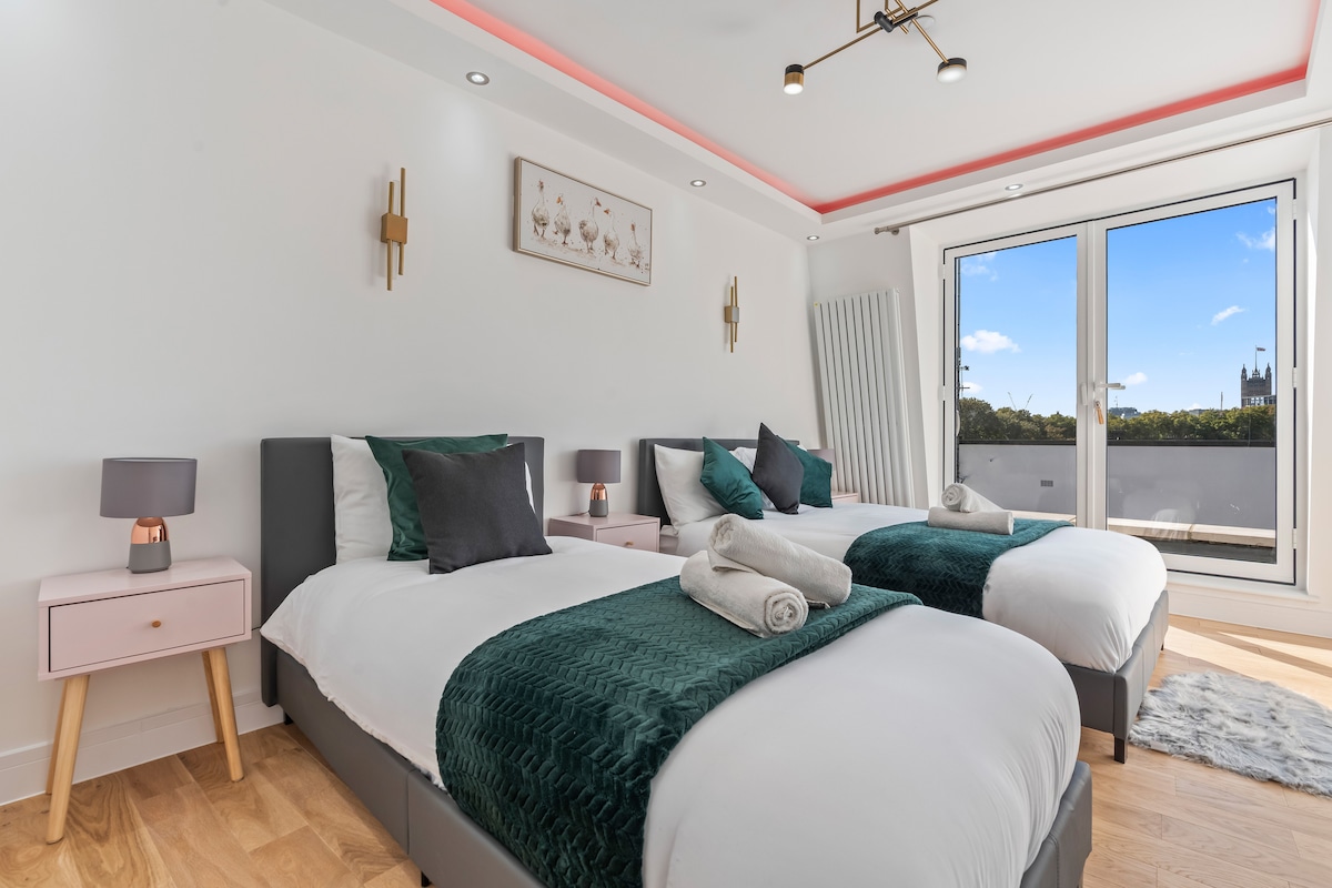Bedroom 2 — double and single beds with views