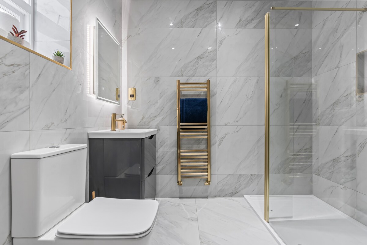 Bathroom with gold fittings
